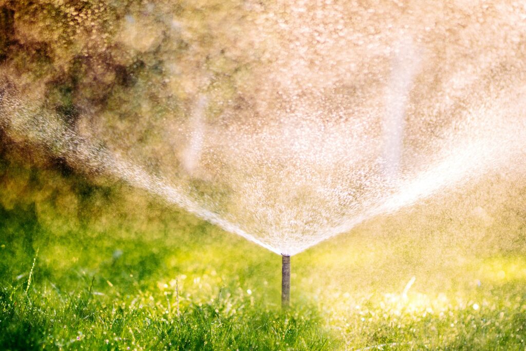 Close up details of automatic lawn pop-up sprinkler. Details of irrigation